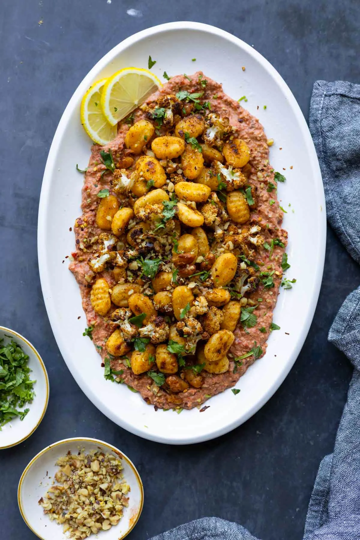 A Culinary Fusion: Crispy Gnocchi Meets Vibrant Muhammara in a Plant-Based Revelation