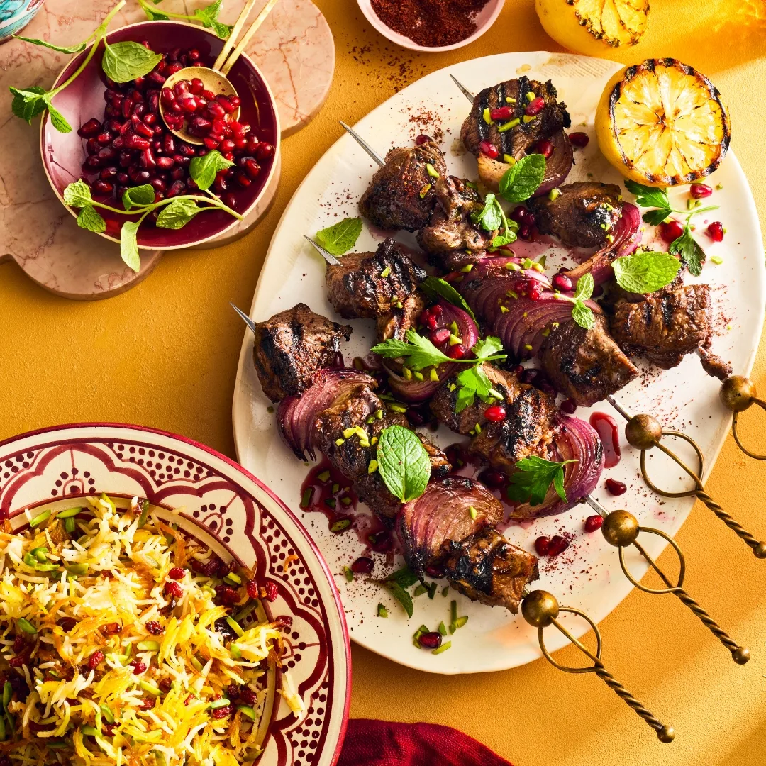 Gourmet Traveller Unveils a Persian Masterpiece: Honey Pomegranate Lamb Skewers with Jewelled Rice
