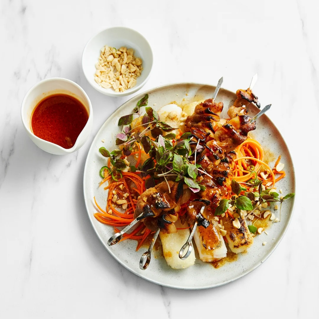 Unveiling a Culinary Masterpiece: Chilli Caramel Pork Skewers with Crisp Rice Noodles – A Gourmet Traveller Sensation