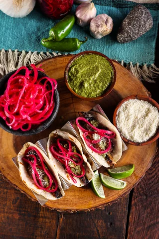 Smoky Adobo Chicken Tacos: A Fiery Fiesta Graced by Meat Church Charcoal