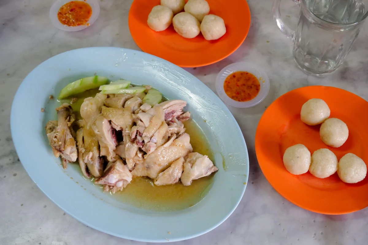 The Geometry of Flavor: How Melaka’s Chicken Rice Balls Preserve a Century of Hainanese Heritage