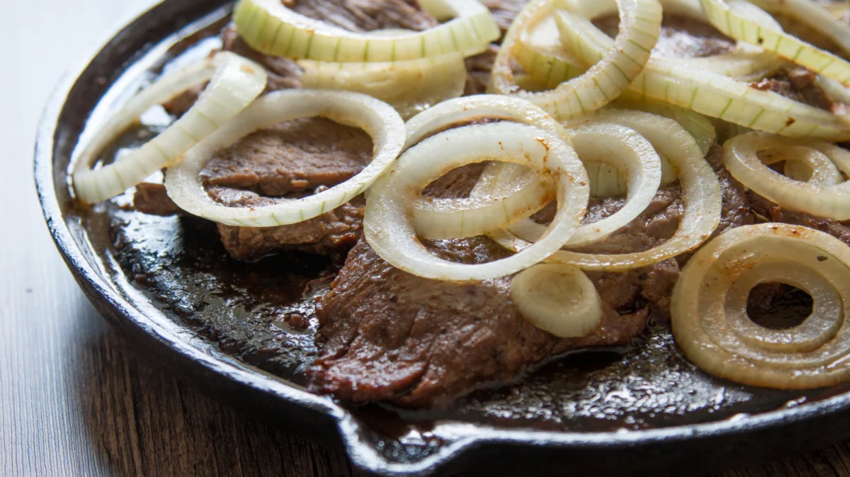 The Science of the Sear: Evaluating Raw Onions as a Culinary Tool for Steak Tenderization