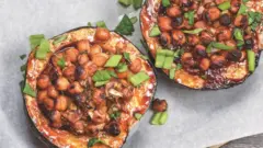 A Culinary Embrace of Autumn: Nicole Malik’s Hoisin-Glazed Stuffed Acorn Squash Elevates Weeknight Dining