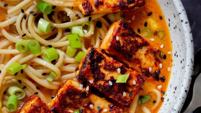 A Culinary Revolution in a Bowl: Spicy Gochujang Peanut Butter Ramen Delights the Palate