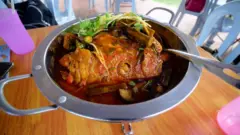 Malaysia’s Culinary Jewel: Unpacking the Delights of Fish Head Curry at Kuala Lumpur’s Tugu View Cafe
